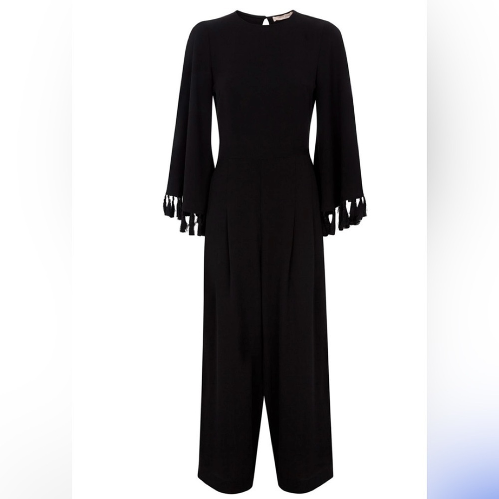 Traffic People Black Let the Stare 70’s Retro size Small fringe cuffs jumpsuit.